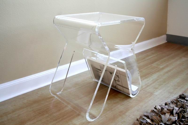 Designer look simply shaped functional stool. Features a beautiful 