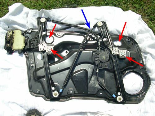 26. Remove the steel spring bracket from the cable/take up reel 