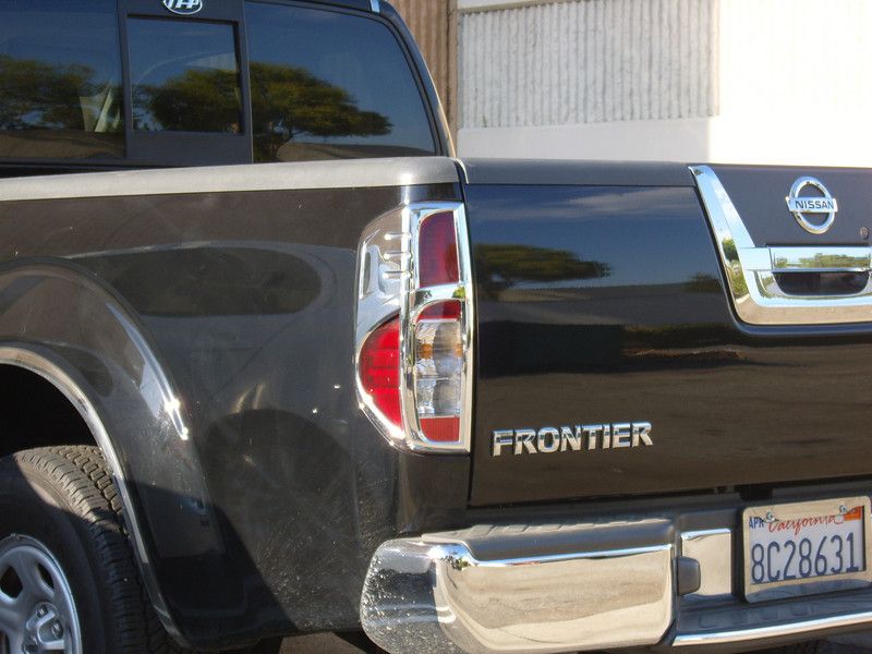 2005 2010 NISSAN FRONTIER CHROME TAIL LIGHT COVERS TFP  