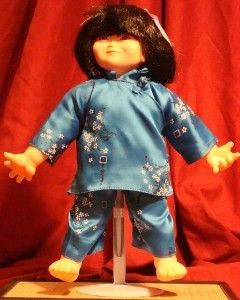 CUTE CHINESE VINYL PASSPORT DOLL, c. 1990s  